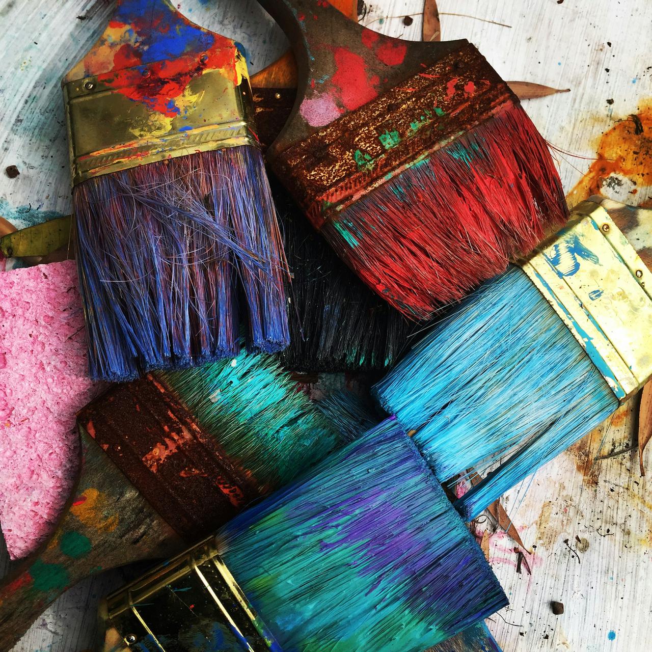 Florida Artist RhondaK paintbrushes drying  She uses colorful paint